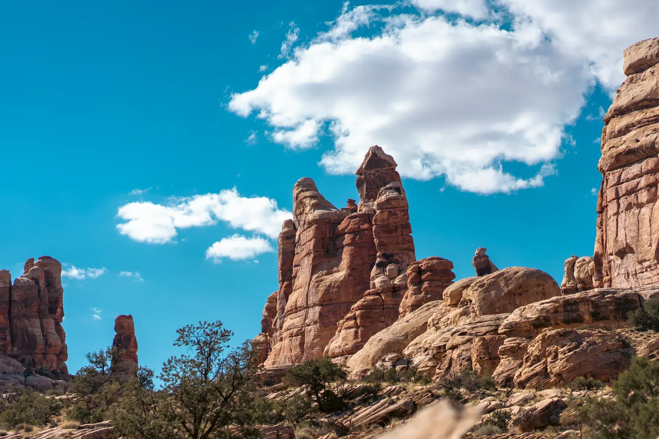 Red rock spires under a blue sky