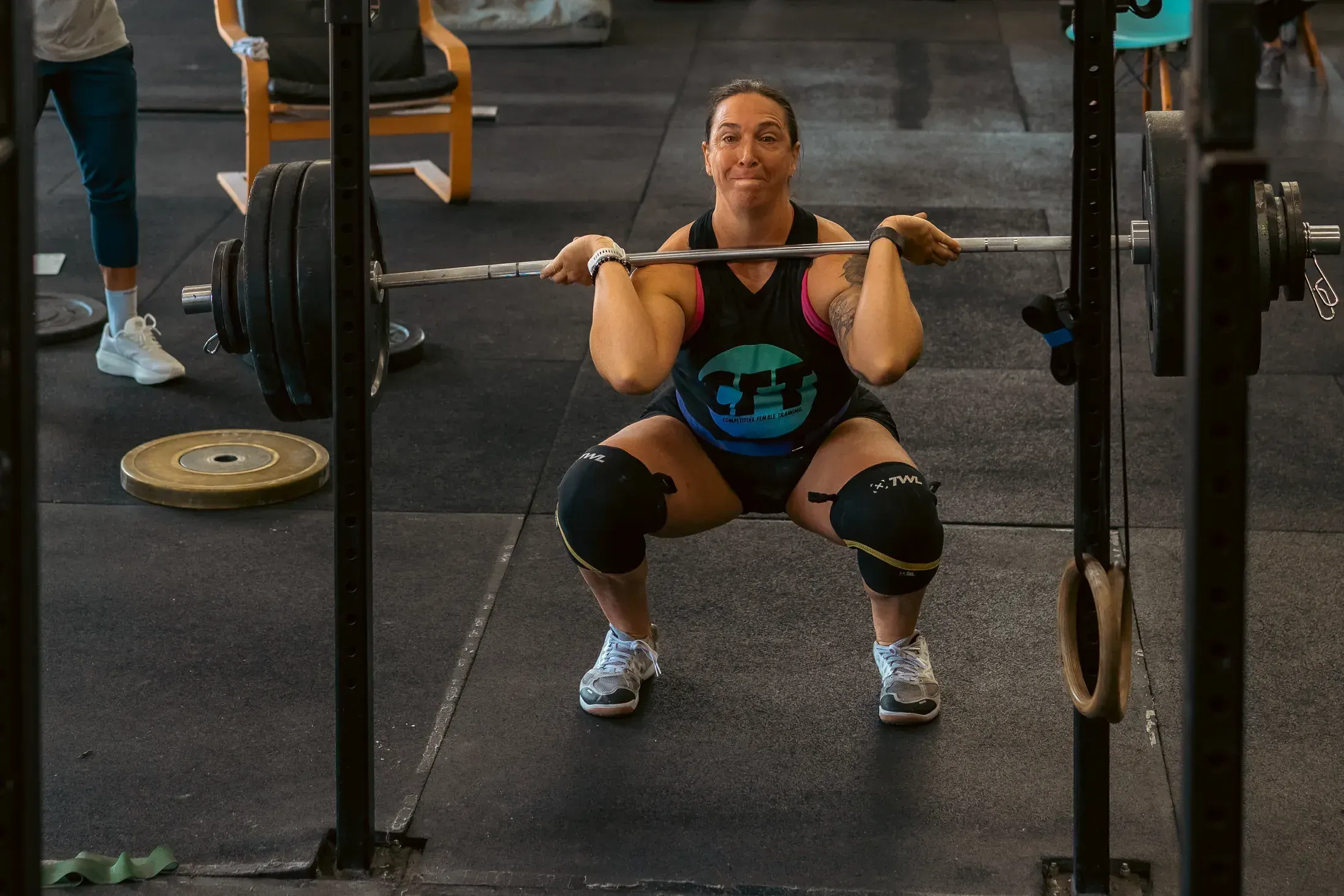 Athlete in the bottom of a back squat