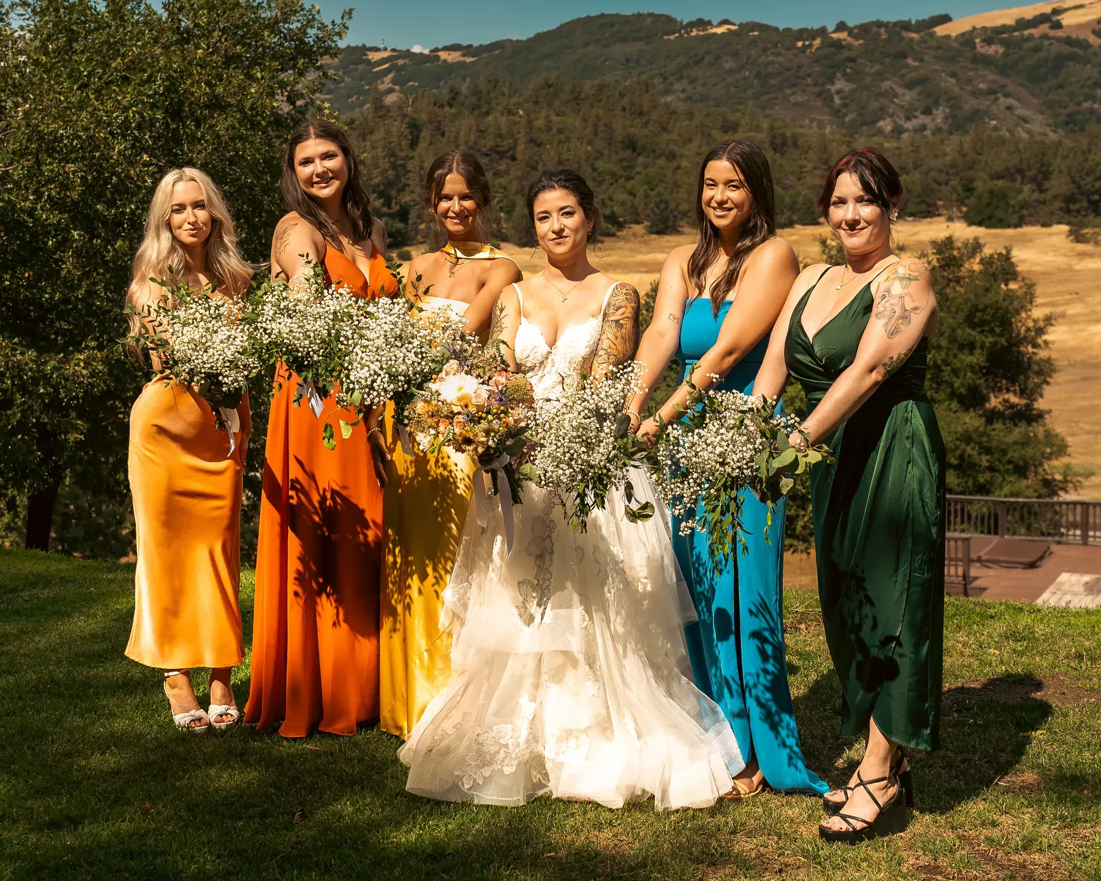Bride with her bridesmaids in the hills