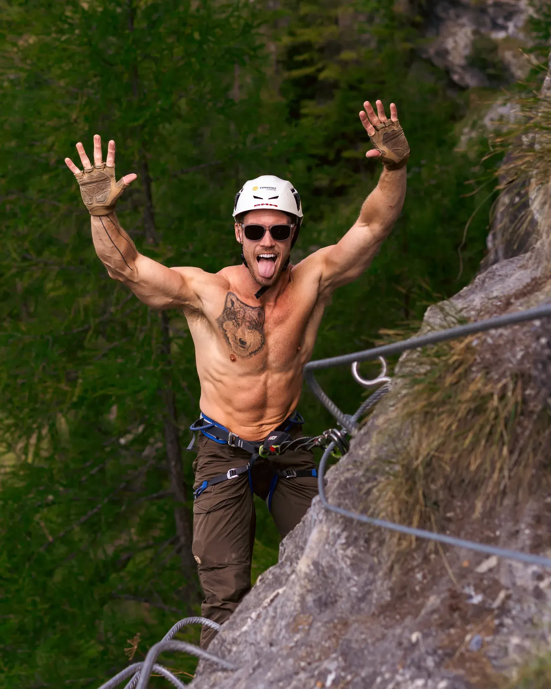 Climber cheering on a via ferrata