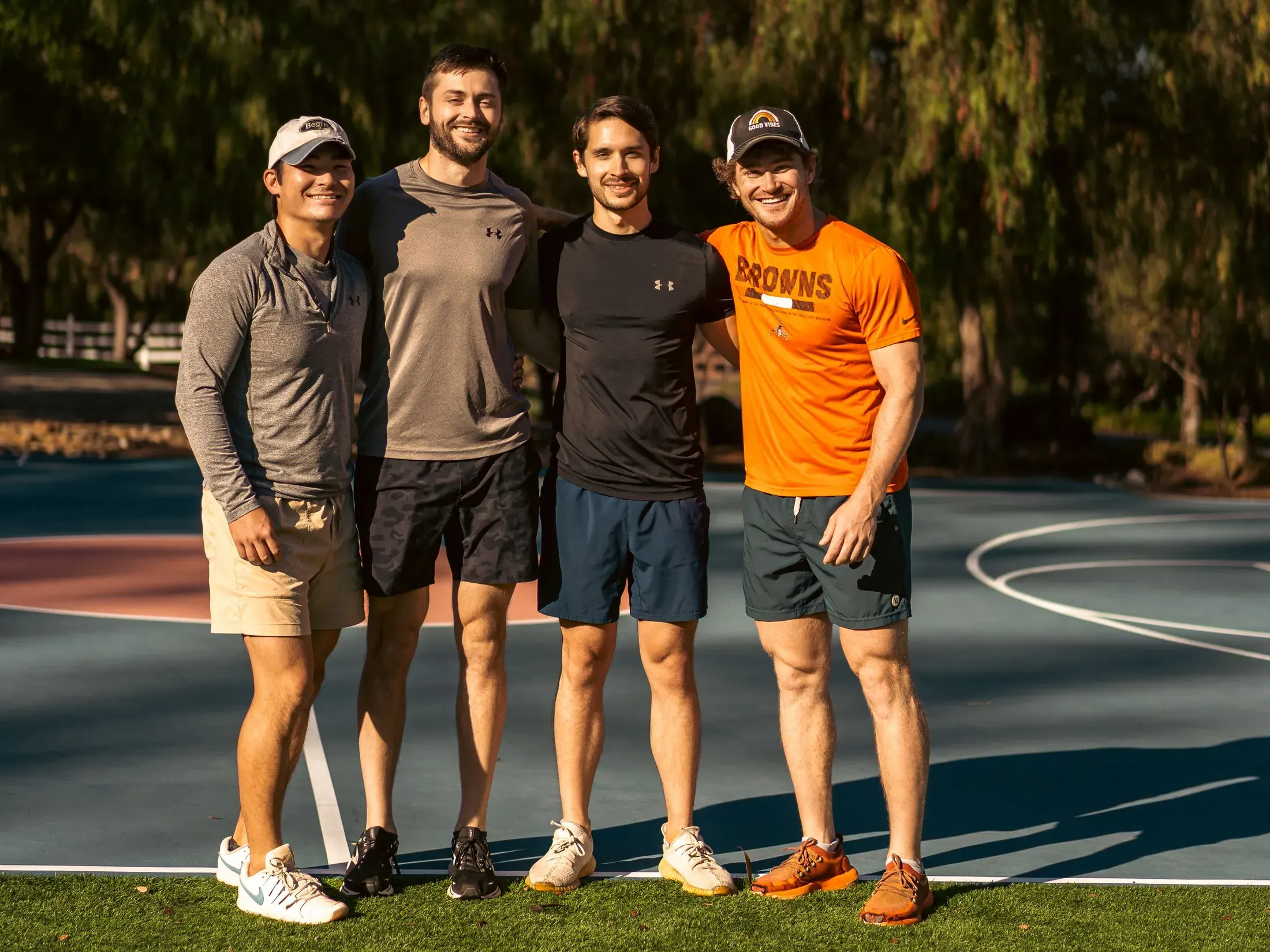 Group of friends in athletic wear on a court